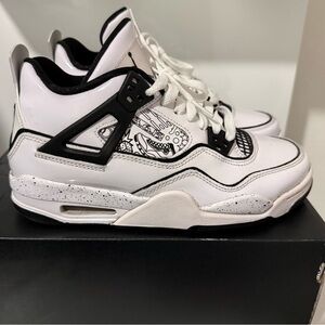 Jordan 4 Retro White and Black Sneakers